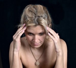 woman migraine headache