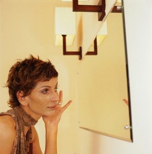 Mature_Woman_Looking_In_Mirror